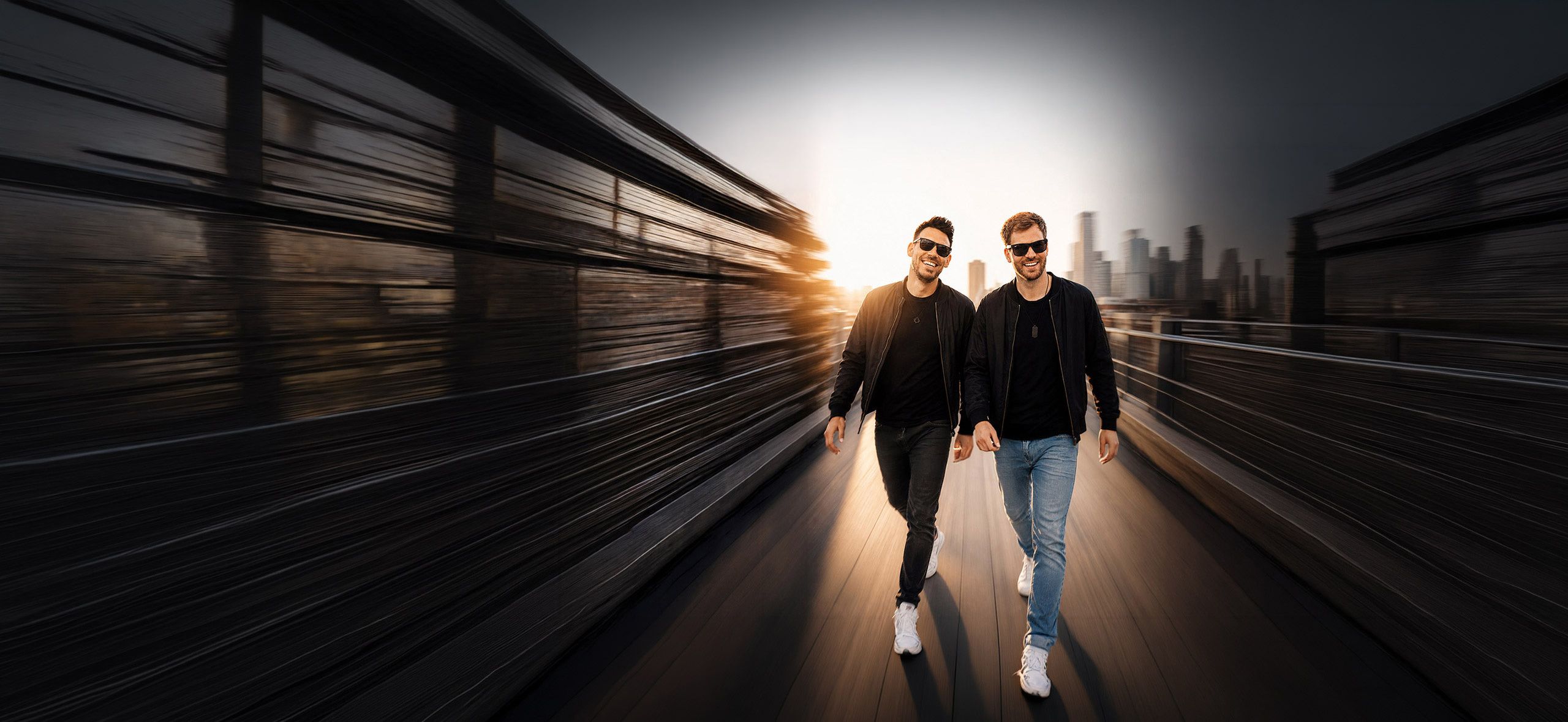 Topmodelz DJ duo Michael Avenue and Marvin Mash walking on a bridge